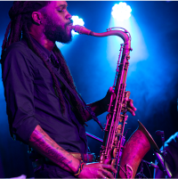 Person playing saxophone