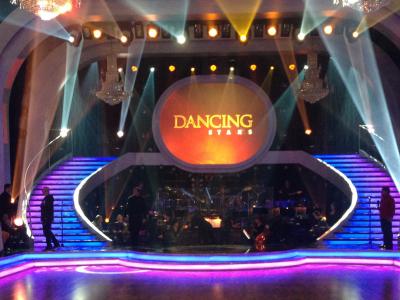 Dancing with the Stars stage with colorful lights and live audience
