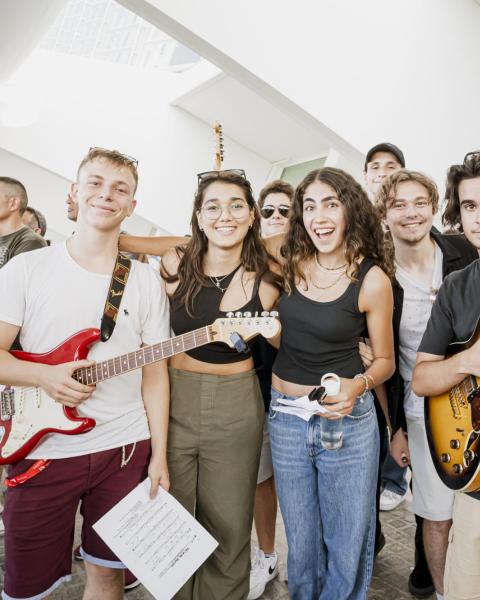 Berklee Valencia summer students holding instruments