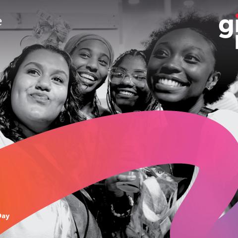 Black and white photo of Berklee students taking a selfie with the Berklee Giving Day logo on the top right corner