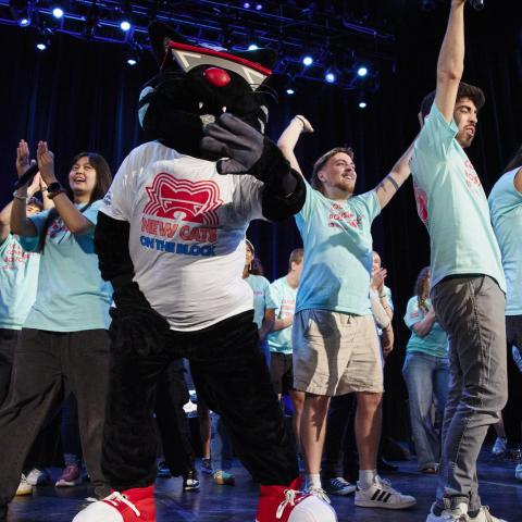 Berklee students and Mingus celebrating on stage 