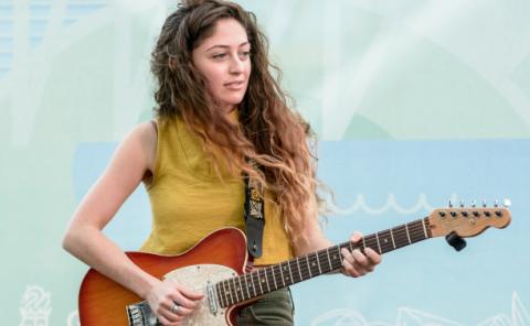 Guitar student performing on Un Lago de Conciertos concert series.