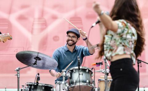 Drummer performing on Un Lago de Conciertos concert series.