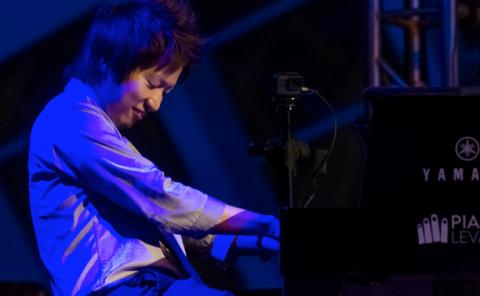 Piano student playing at “La Nit de Berklee”, the farewell concert representing the culmination of a year of work, learning, and achievements.