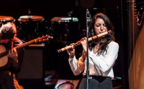 Indian flute student during a collaboration performance between the M.A. in Contemporary Performance (Production Concentration) and the M.M. in Music Production, Technology, and Innovation.