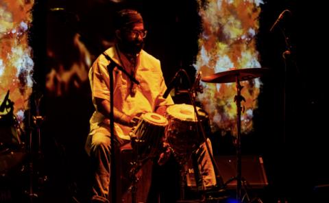 Tabla player during a collaboration performance between the M.A. in Contemporary Performance (Production Concentration) and the M.M. in Music Production, Technology, and Innovation.