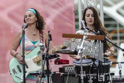 one bass student playing with a drummer
