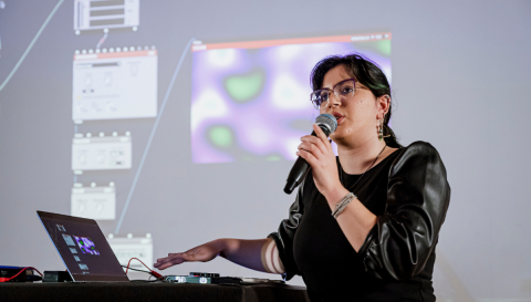 Student presents her work at INO CON